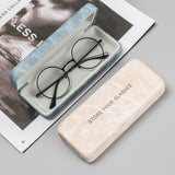 étui à lunettes en acier